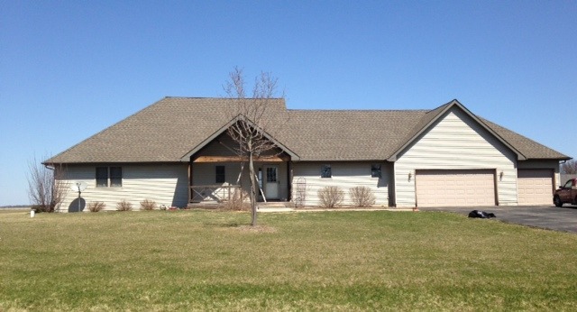 3529 East 2089th Road Serena, IL 60549 - Photo 1 of 19 a front view of a house with a yard
