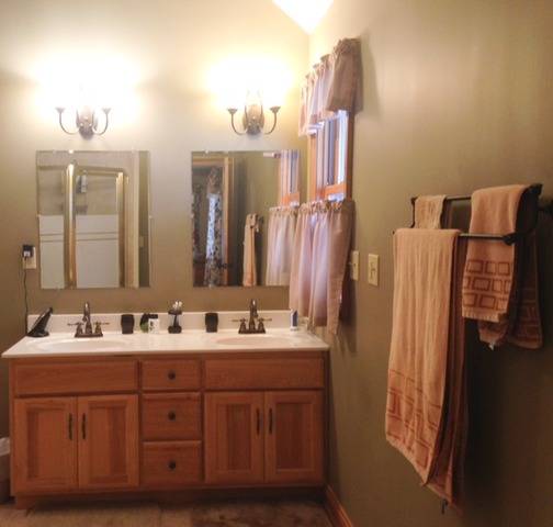 3529 East 2089th Road Serena, IL 60549 - Photo 14 of 19 a bathroom with double vanity and a mirror