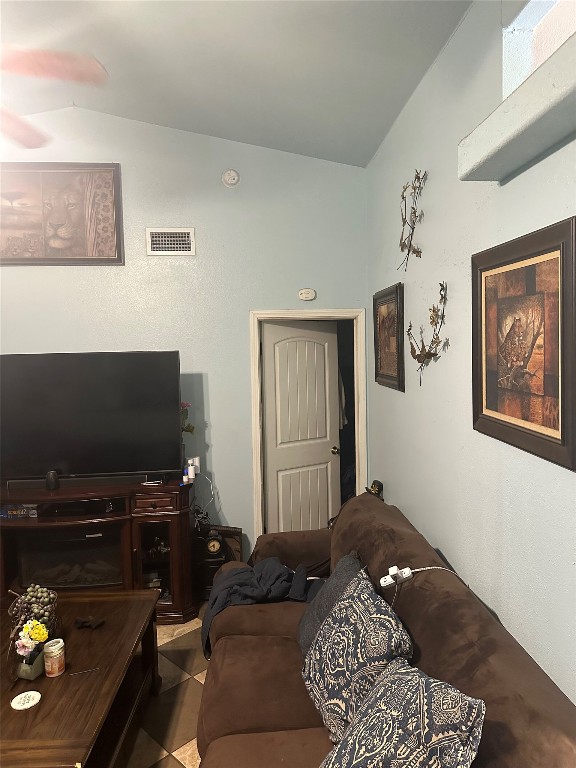 7007 Colony Loop Drive Austin, TX 78724 - Photo 15 of 18 a bedroom with a bed and flat screen tv