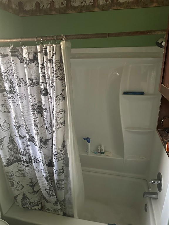 7007 Colony Loop Drive Austin, TX 78724 - Photo 16 of 18 a bathroom with a bathtub and shower