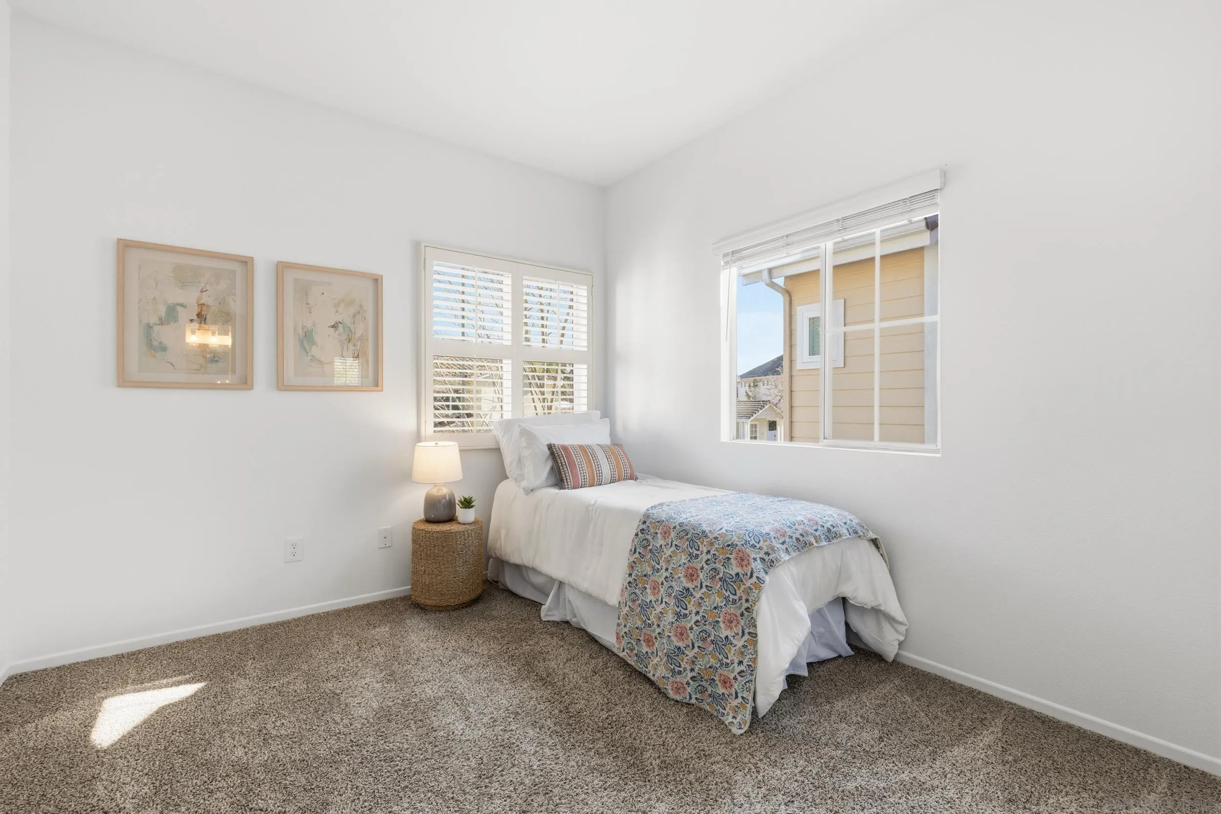 1126 Pacifica Place Encinitas, CA 92024 - Photo 11 of 18 a bedroom with a bed and wooden floor