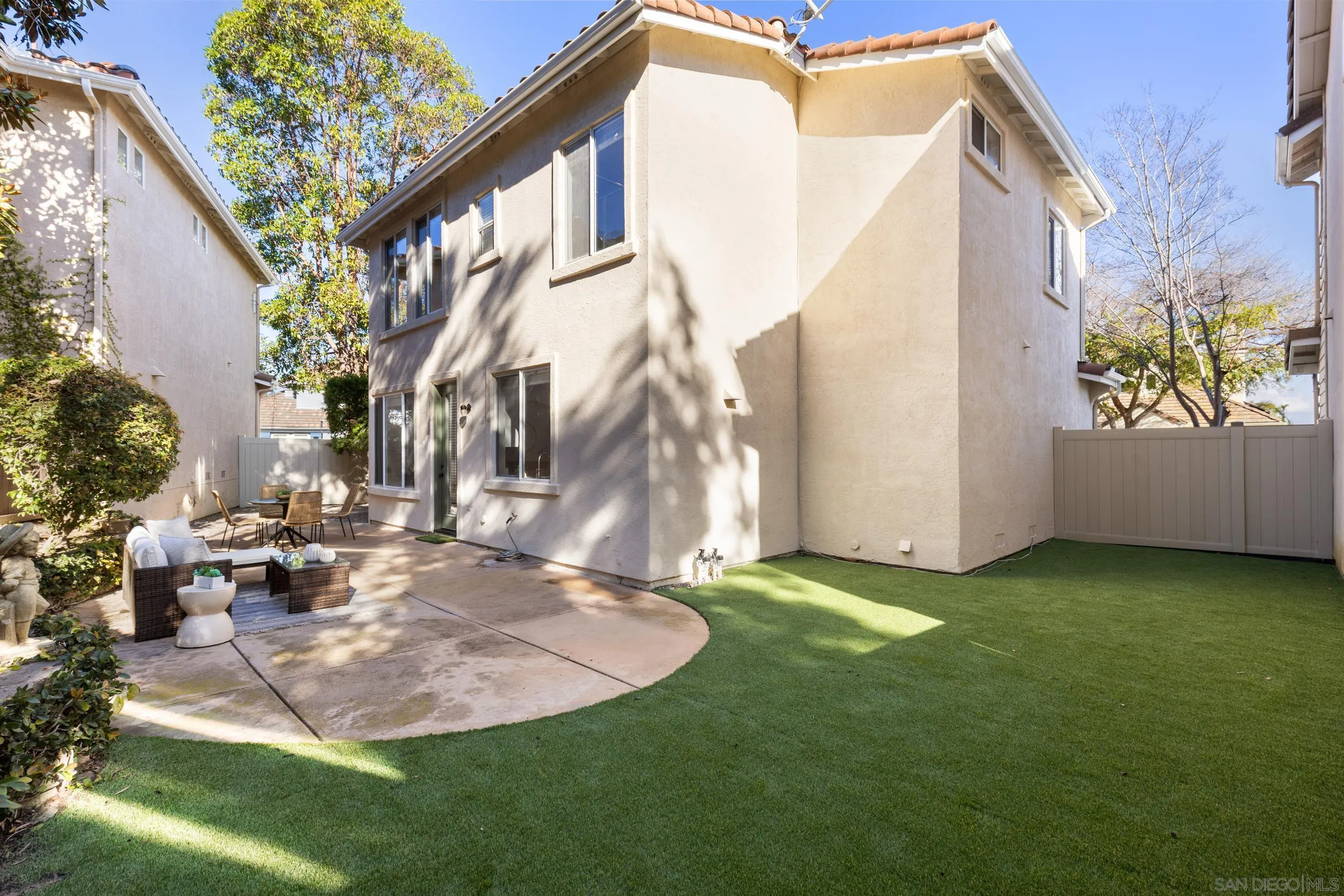 1126 Pacifica Place Encinitas, CA 92024 - Photo 15 of 18 a view of a house with a backyard