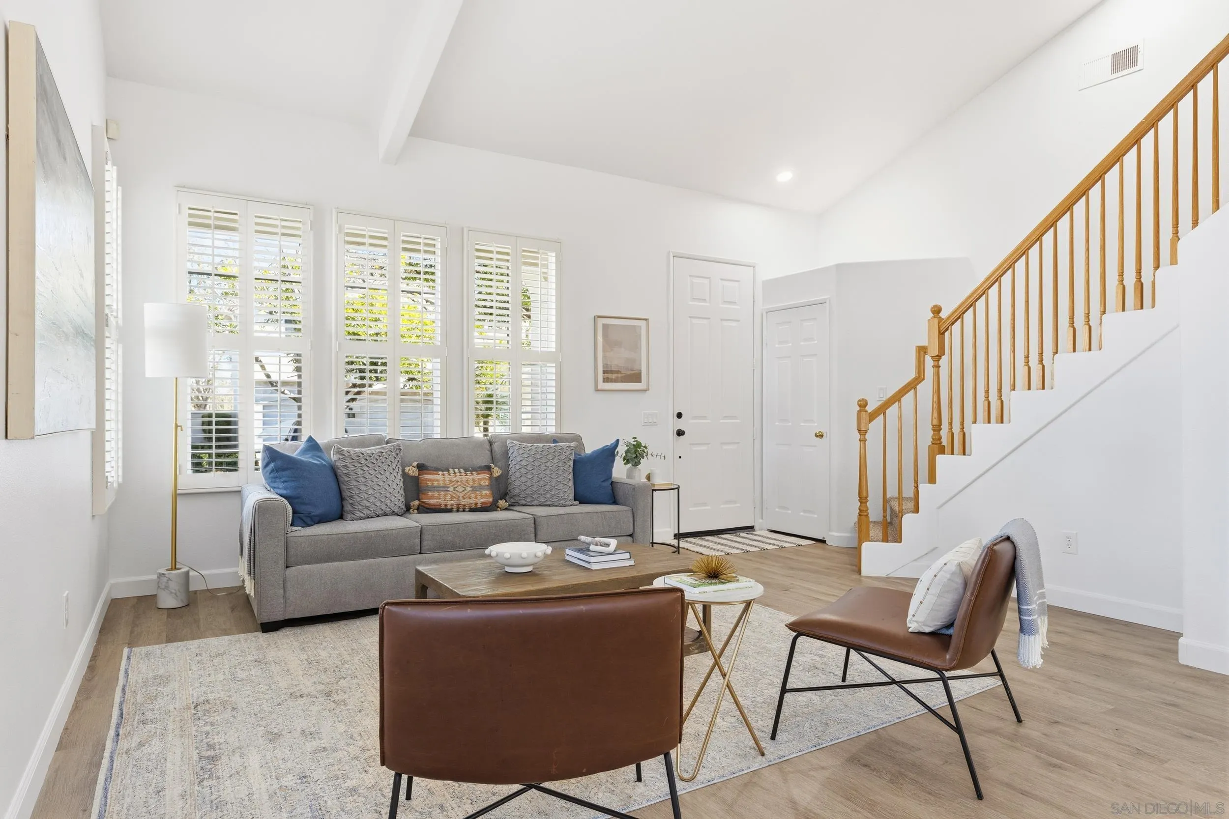 1126 Pacifica Place Encinitas, CA 92024 - Photo 4 of 18 a living room with furniture and a table