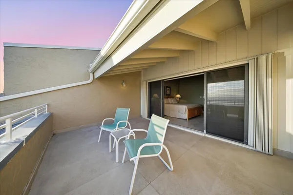 a view of a hallway with closet