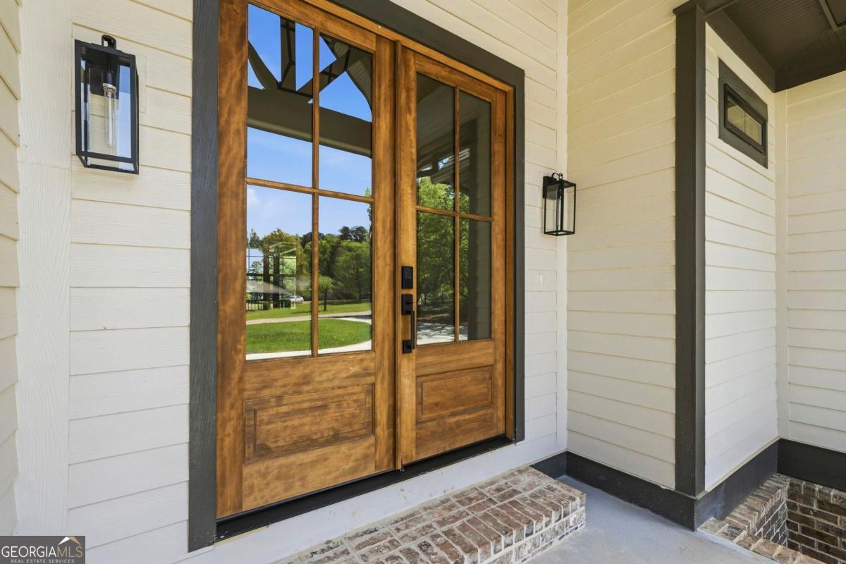 141 Grimes Road Northeast Milledgeville, GA 31061 - Photo 6 of 74 a view of a door and a window
