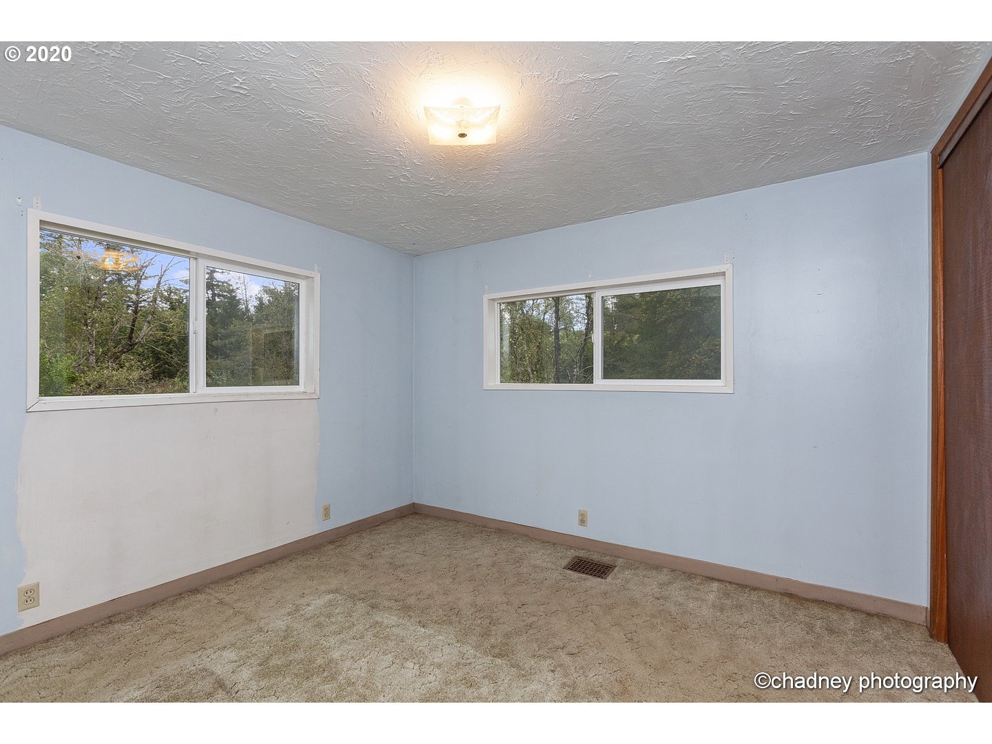 33833 Southeast Hurlburt Road Corbett, OR 97019 - Photo 14 of 32 a view of an empty room with a window