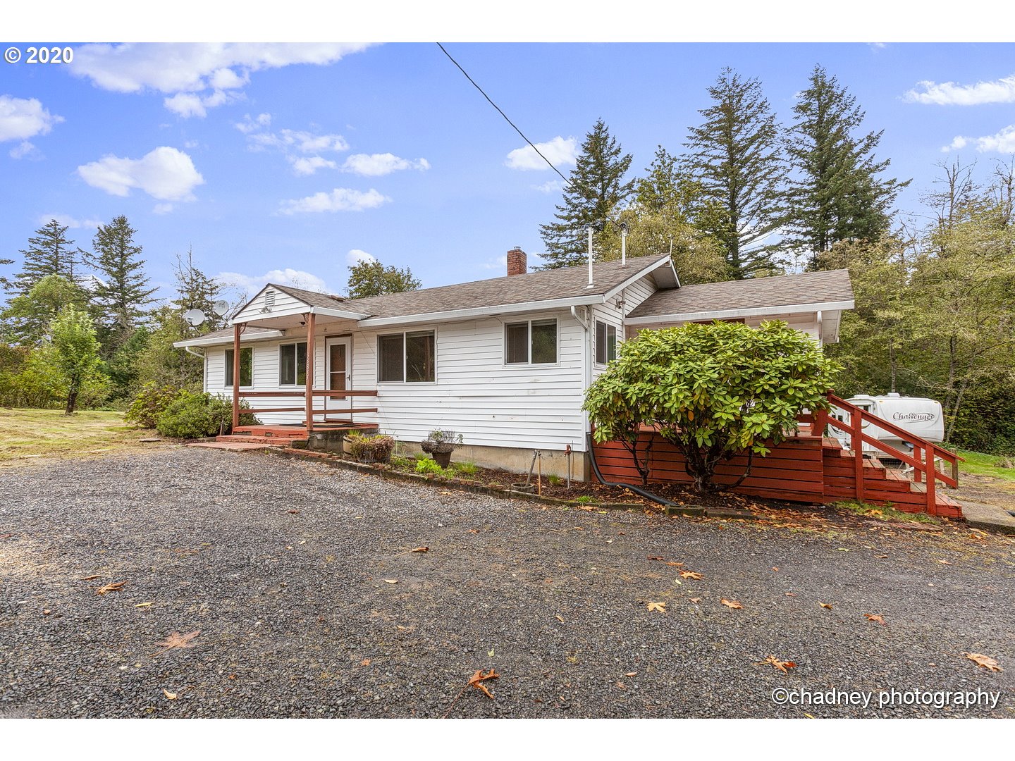 33833 Southeast Hurlburt Road Corbett, OR 97019 - Photo 3 of 32 a view of a house with a yard and potted plants