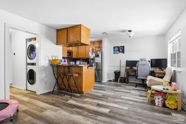 a view of living room with washer and dryer