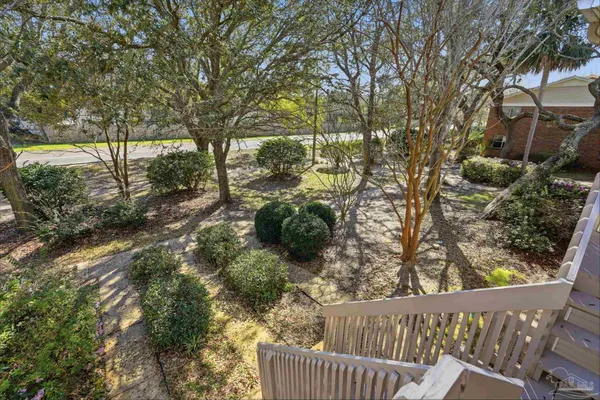 a view of a backyard of the house