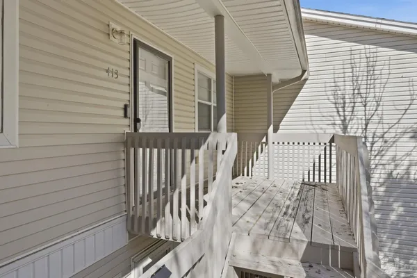 a view of a balcony with door