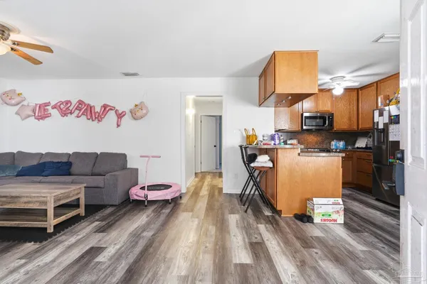 a living room with a couch and a table