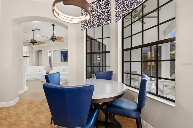 a bedroom with a bed and a view of living room