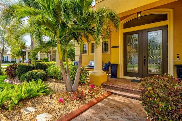a view of a living room and entryway