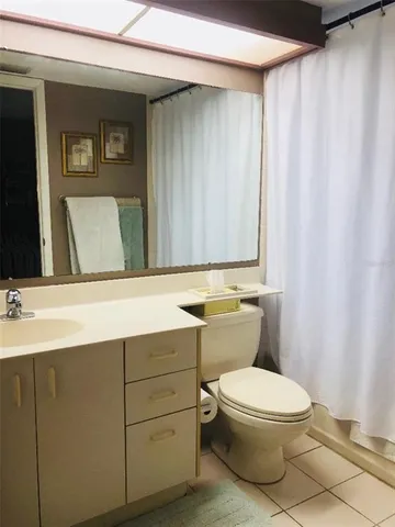 a view of a swimming pool with an ocean view