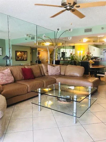 a living room with a couch and a table