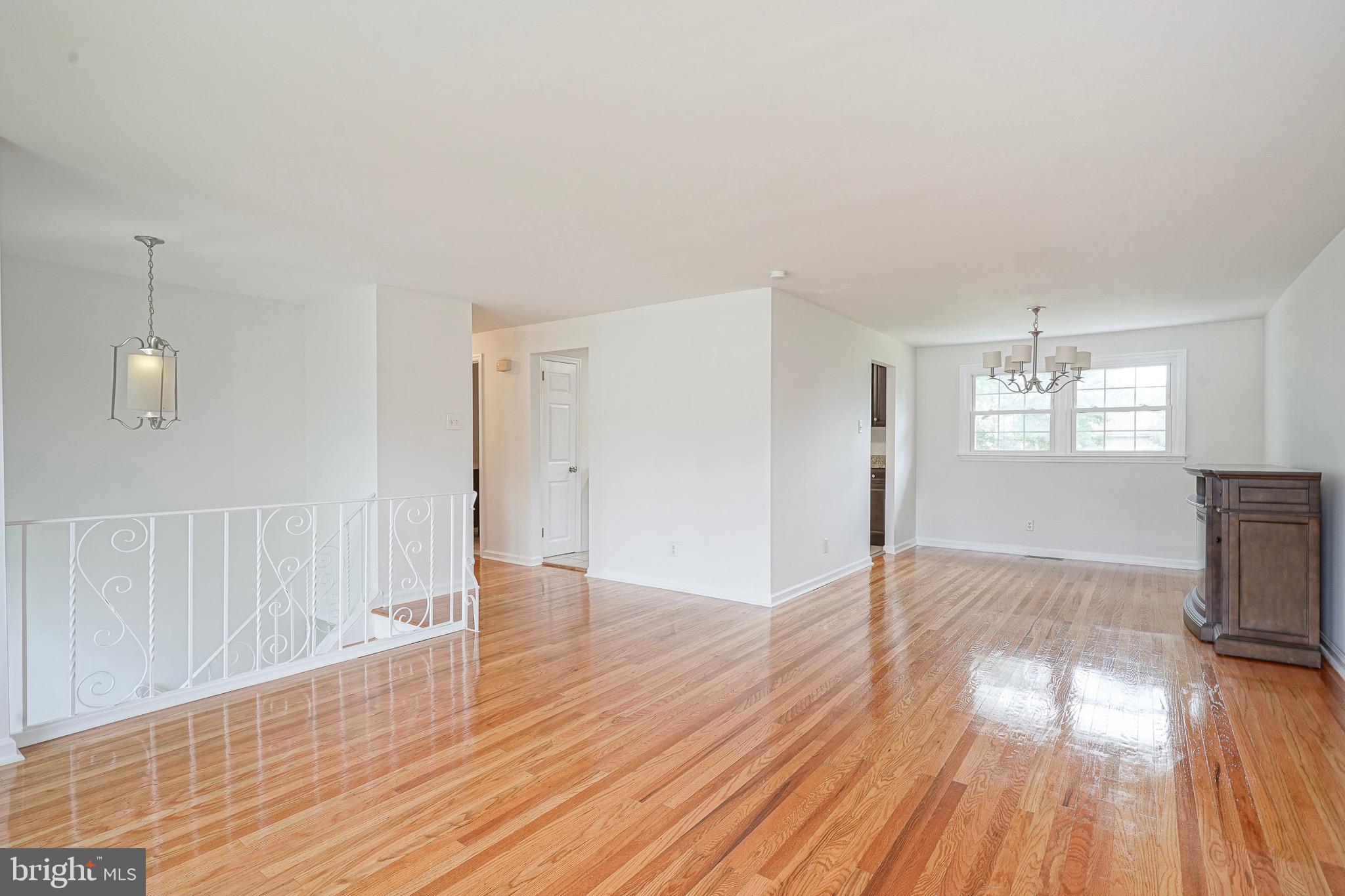 502 Pomona Road Cinnaminson, NJ 08077 - Photo 24 of 34 a view of an empty room with wooden floor and a window