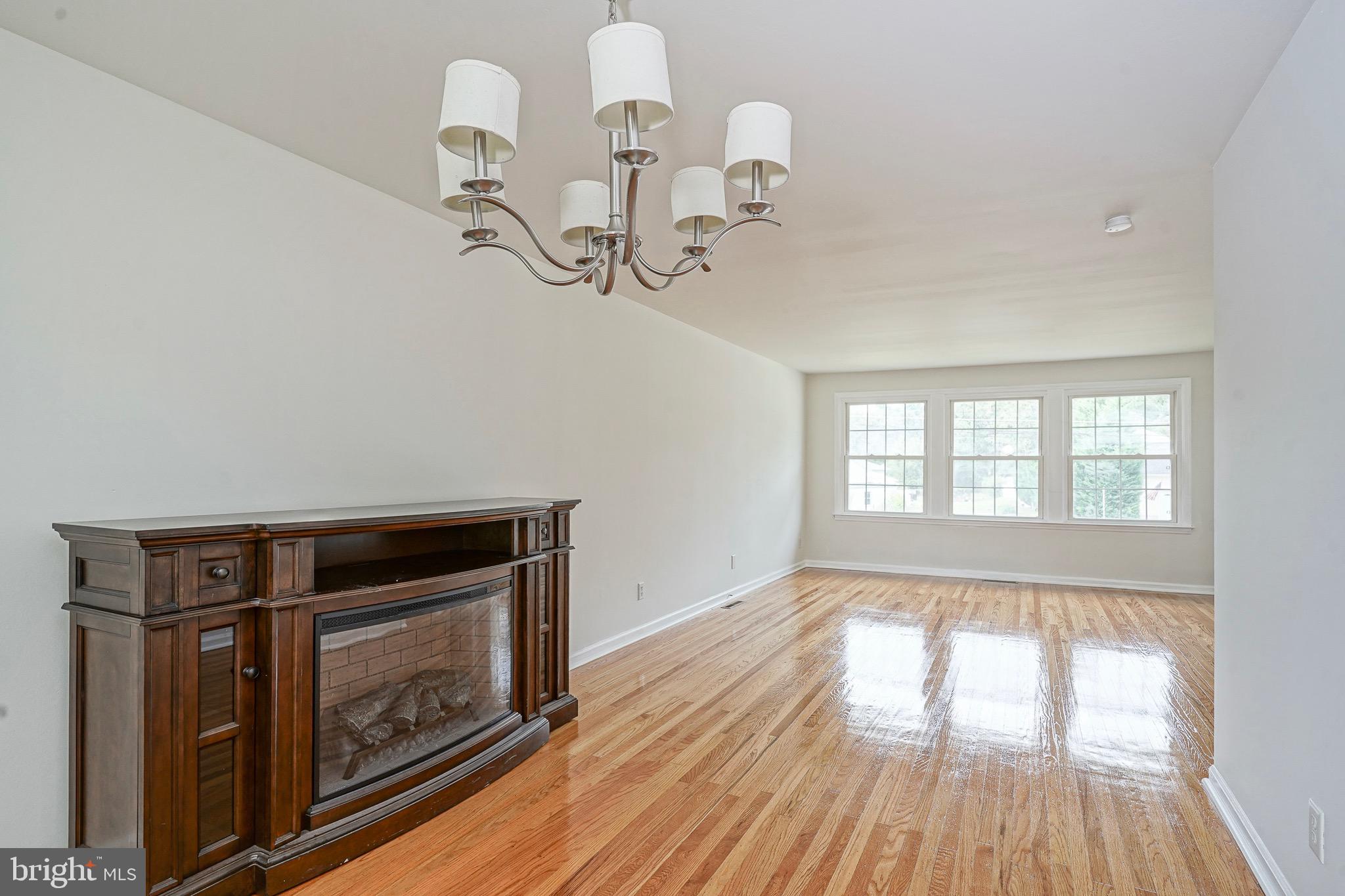 502 Pomona Road Cinnaminson, NJ 08077 - Photo 3 of 34 a kitchen with a window and wooden floor