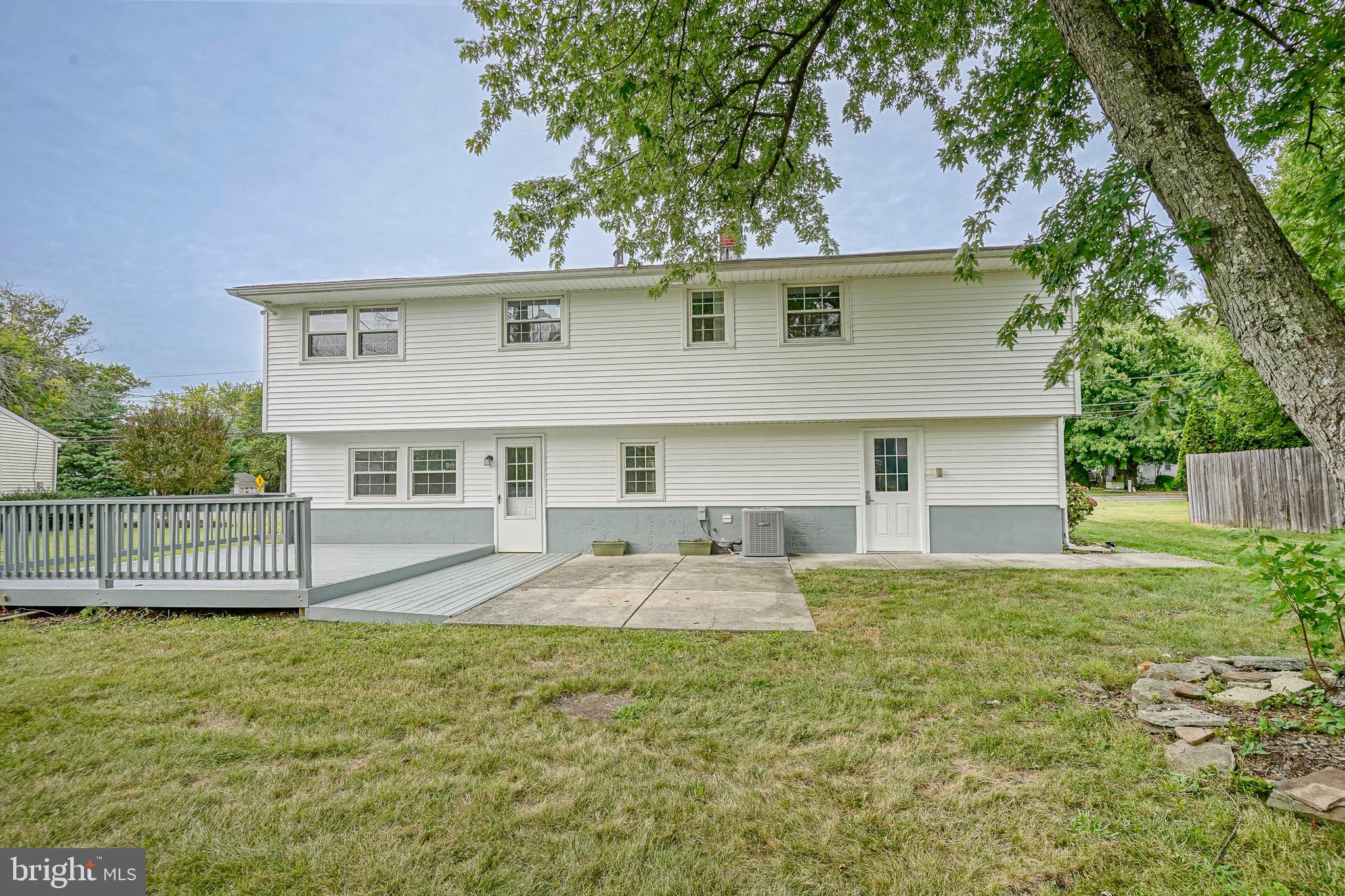 502 Pomona Road Cinnaminson, NJ 08077 - Photo 6 of 34 a front view of a house with a yard