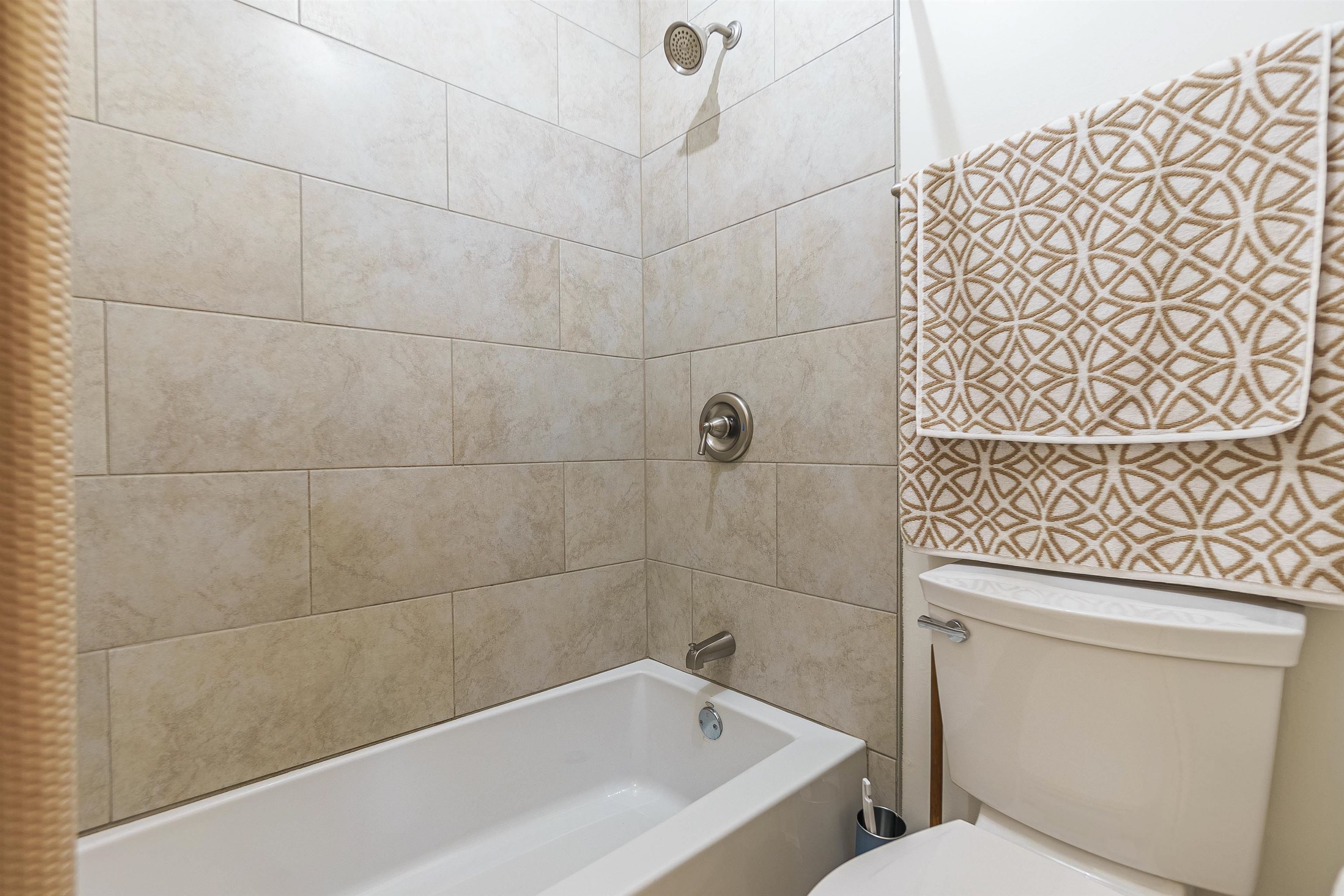 6419 Ragan Farm Drive Memphis, TN 38141 - Photo 21 of 27 Bathroom with shower / tub combo with curtain and toilet
