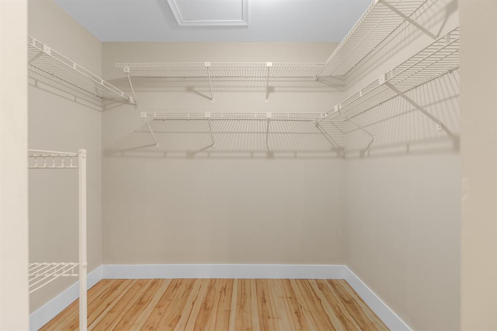 7836 Cloverfield Circle Boca Raton, FL 33433 - Photo 18 of 39 a view of a room with racks on the wall