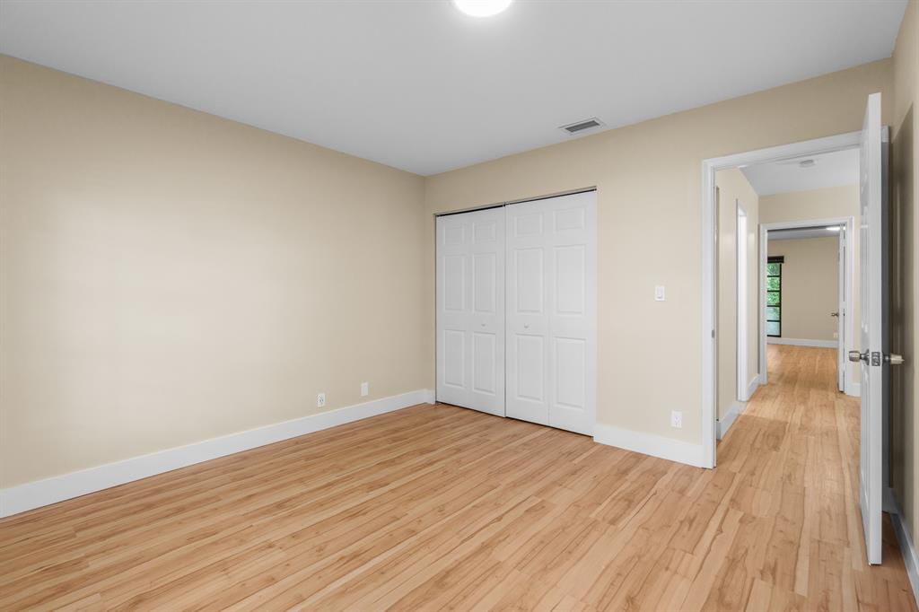 7836 Cloverfield Circle Boca Raton, FL 33433 - Photo 28 of 39 wooden floor in an empty room