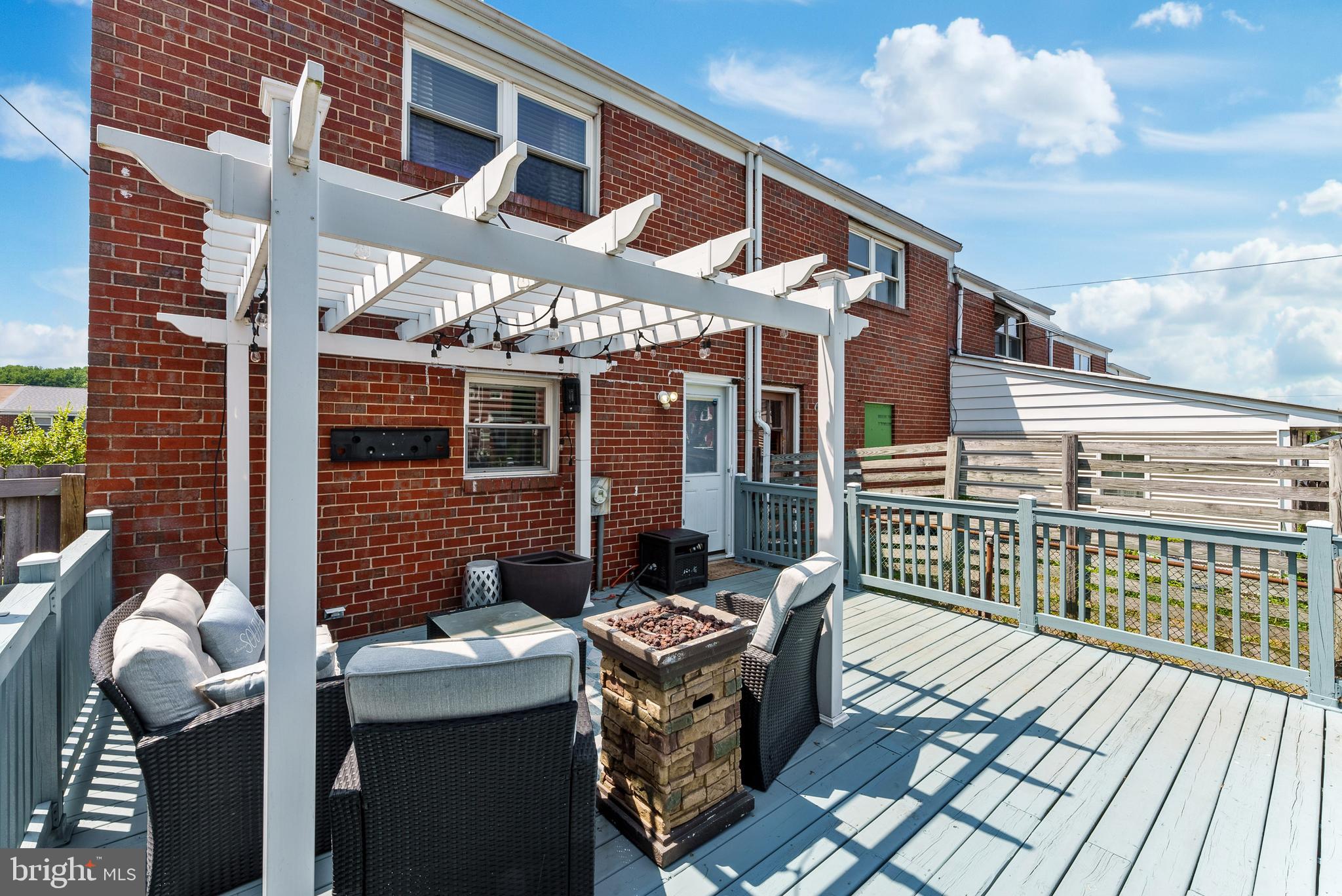 5633 Chelwynd Road Halethorpe, MD 21227 - Photo 39 of 41 a view of a patio with a table and chairs