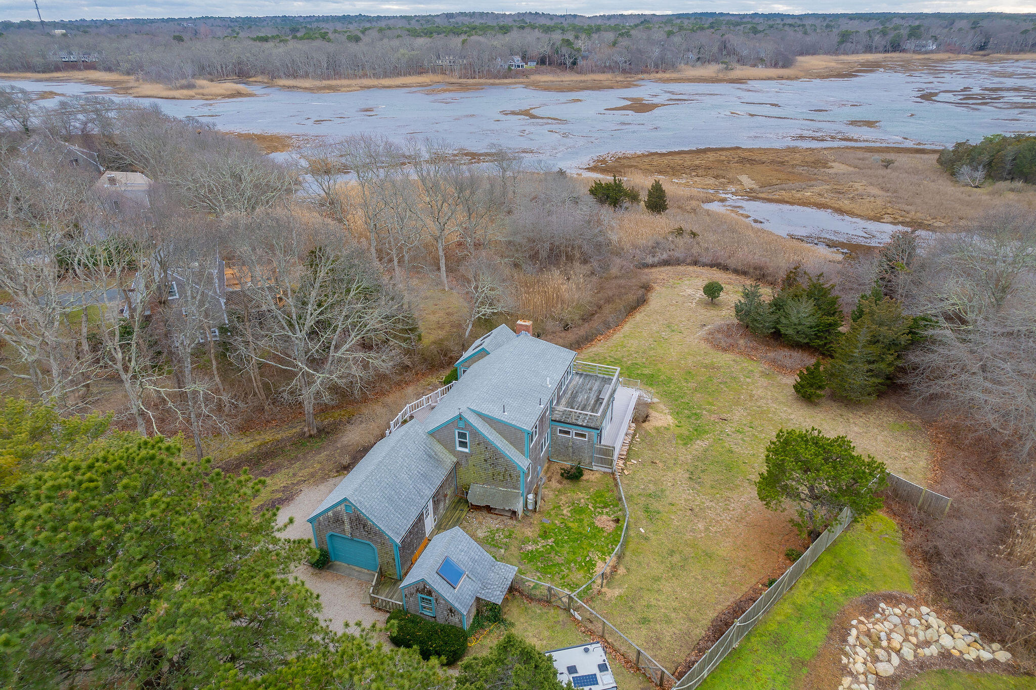 52 Captain Linnell Road Orleans, MA 02653 - Photo 2 of 45 an aerial view of a house with a yard