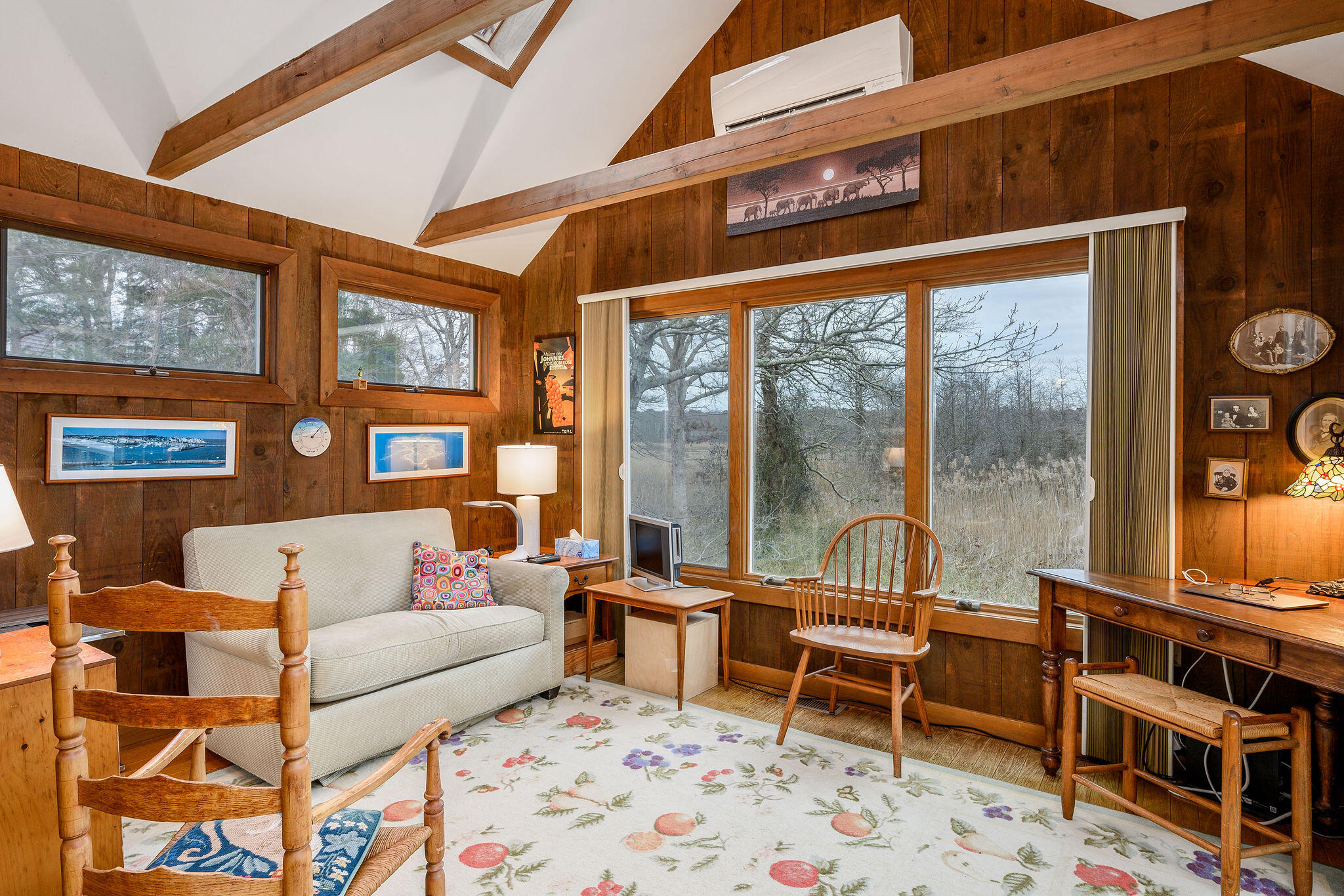 52 Captain Linnell Road Orleans, MA 02653 - Photo 23 of 45 a living room with furniture and a floor to ceiling window