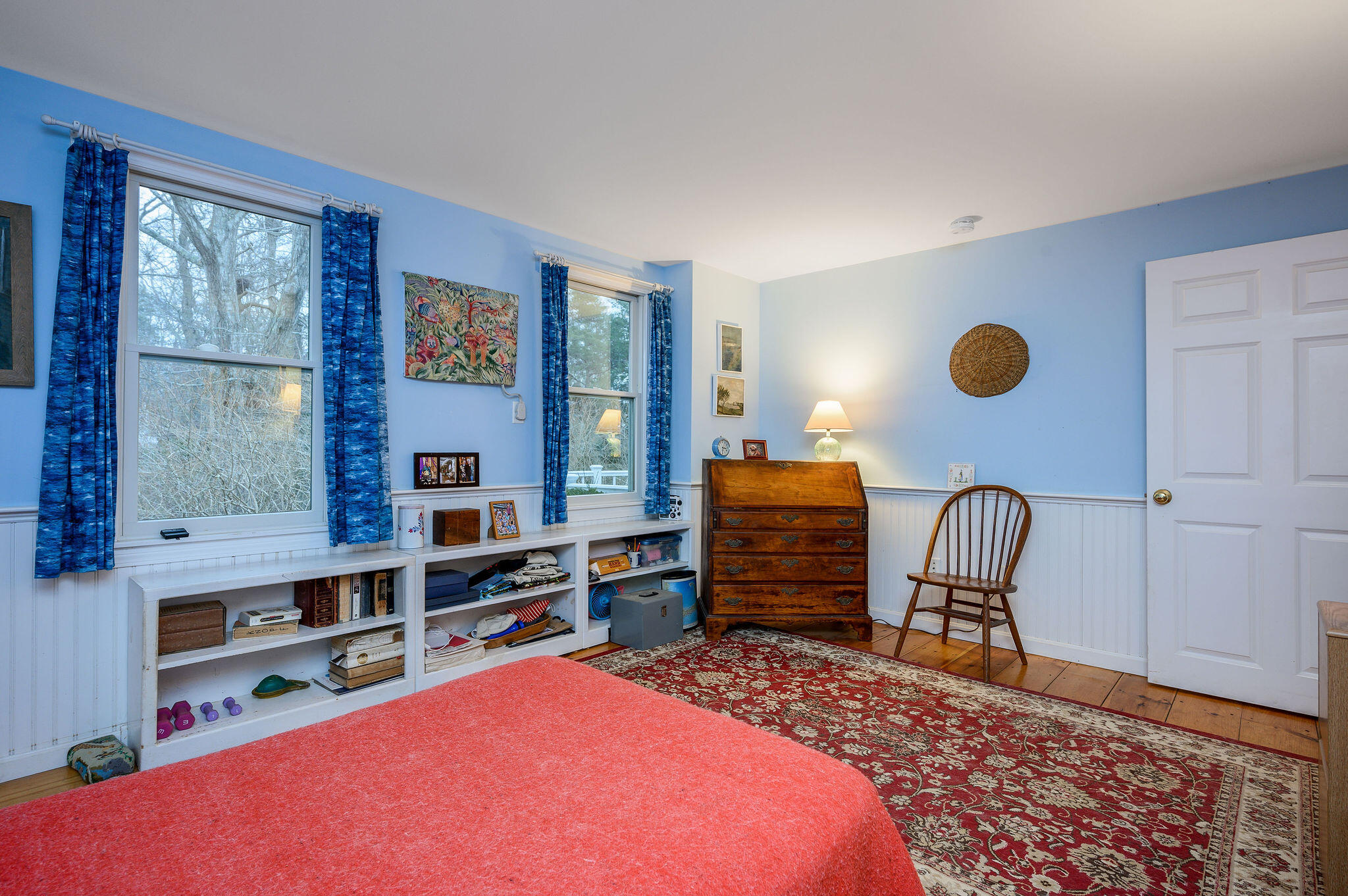 52 Captain Linnell Road Orleans, MA 02653 - Photo 27 of 45 a bedroom with a bed closet and flat tv screen