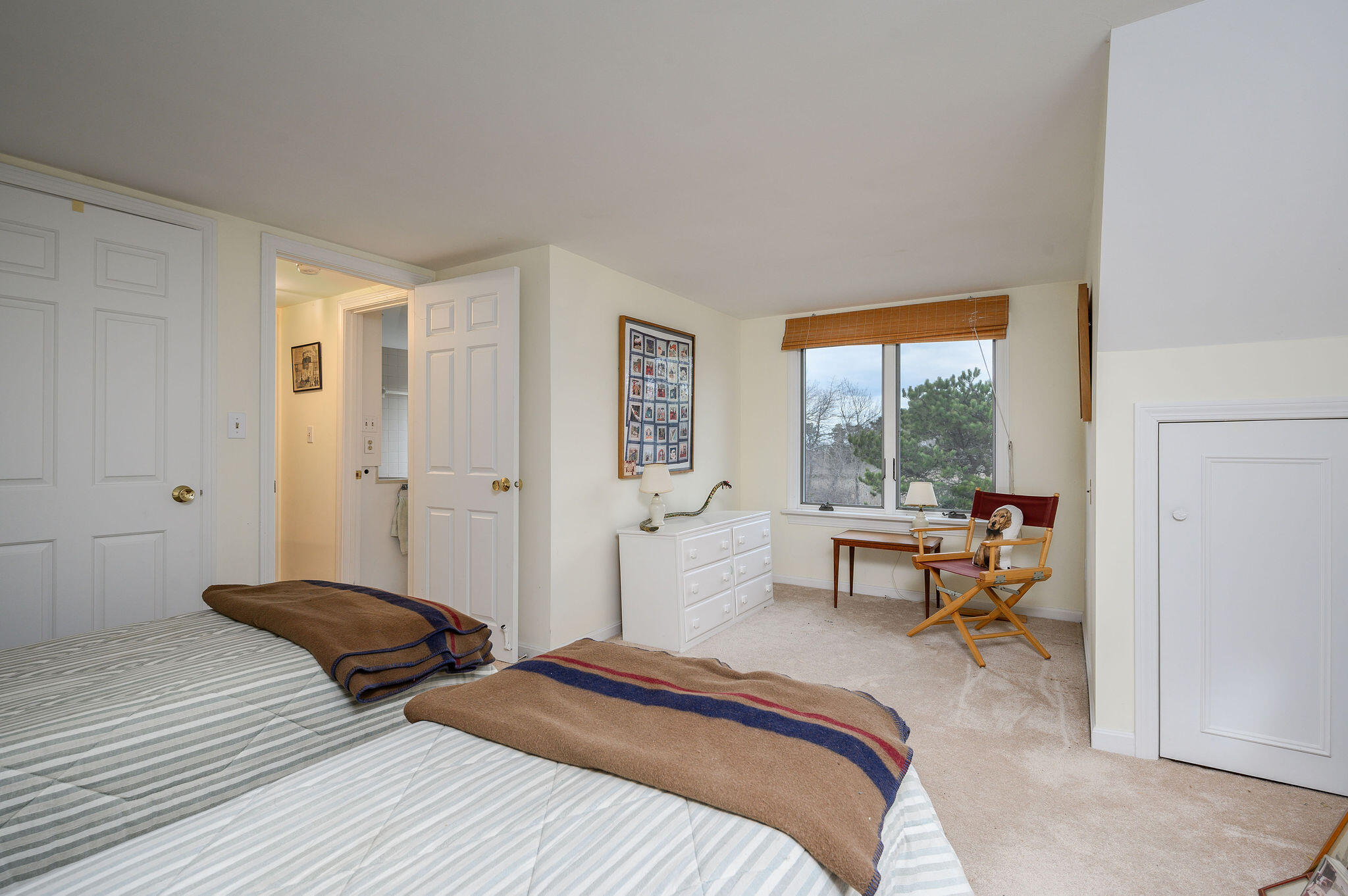 52 Captain Linnell Road Orleans, MA 02653 - Photo 34 of 45 a bedroom with a bed and a window