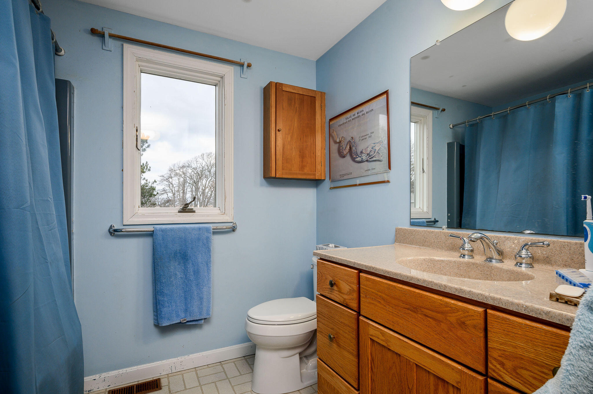 52 Captain Linnell Road Orleans, MA 02653 - Photo 36 of 45 a bathroom with a sink vanity and toilet