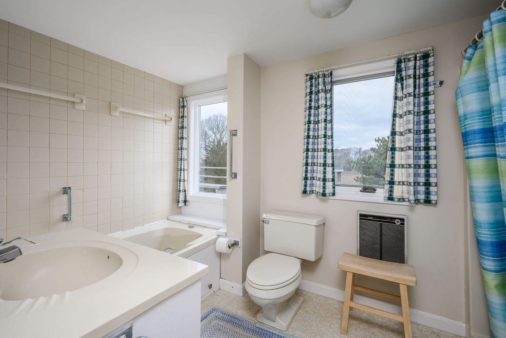 52 Captain Linnell Road Orleans, MA 02653 - Photo 37 of 45 a bathroom with a sink toilet vanity and tub