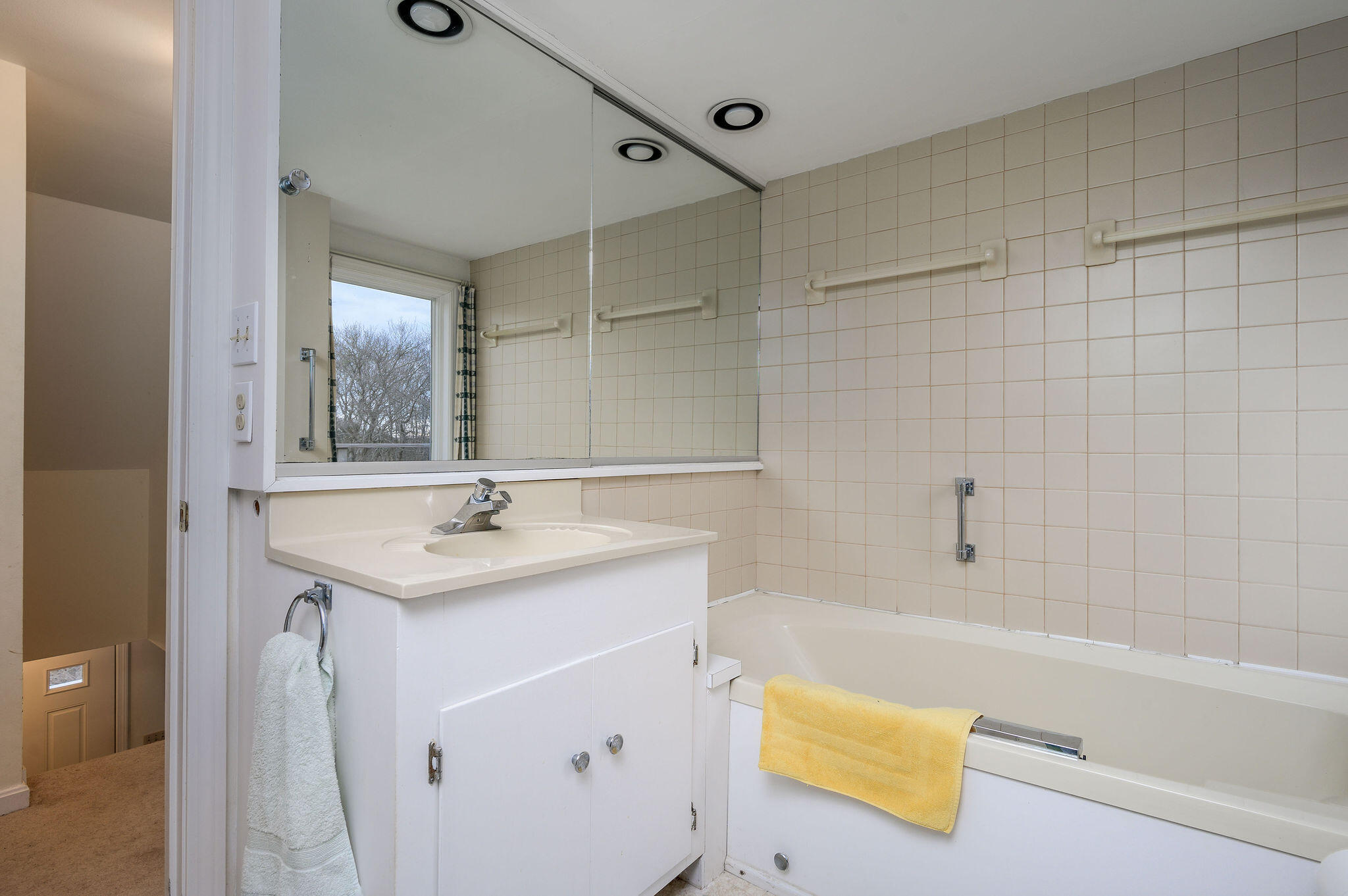 52 Captain Linnell Road Orleans, MA 02653 - Photo 38 of 45 a bathroom with a tub sink and mirror