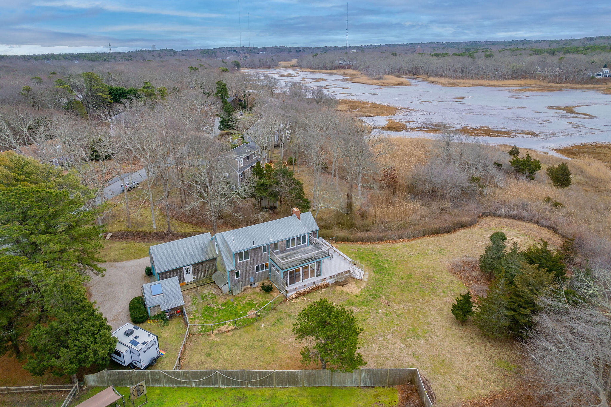 52 Captain Linnell Road Orleans, MA 02653 - Photo 4 of 45 an aerial view of a house with a yard