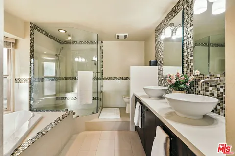 a wooden bench sitting in the middle of a house