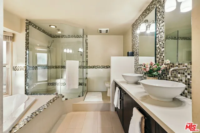 a wooden bench sitting in the middle of a house