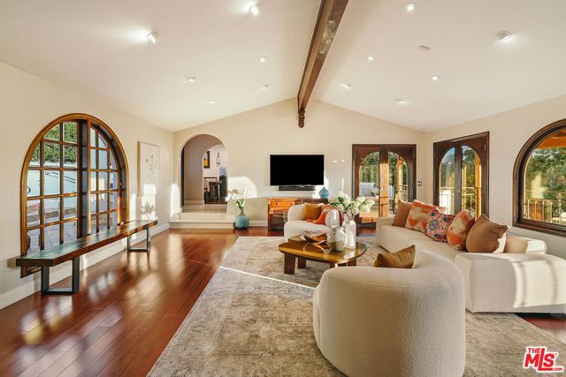 a view of hall way with furniture