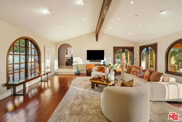 a view of hall way with furniture