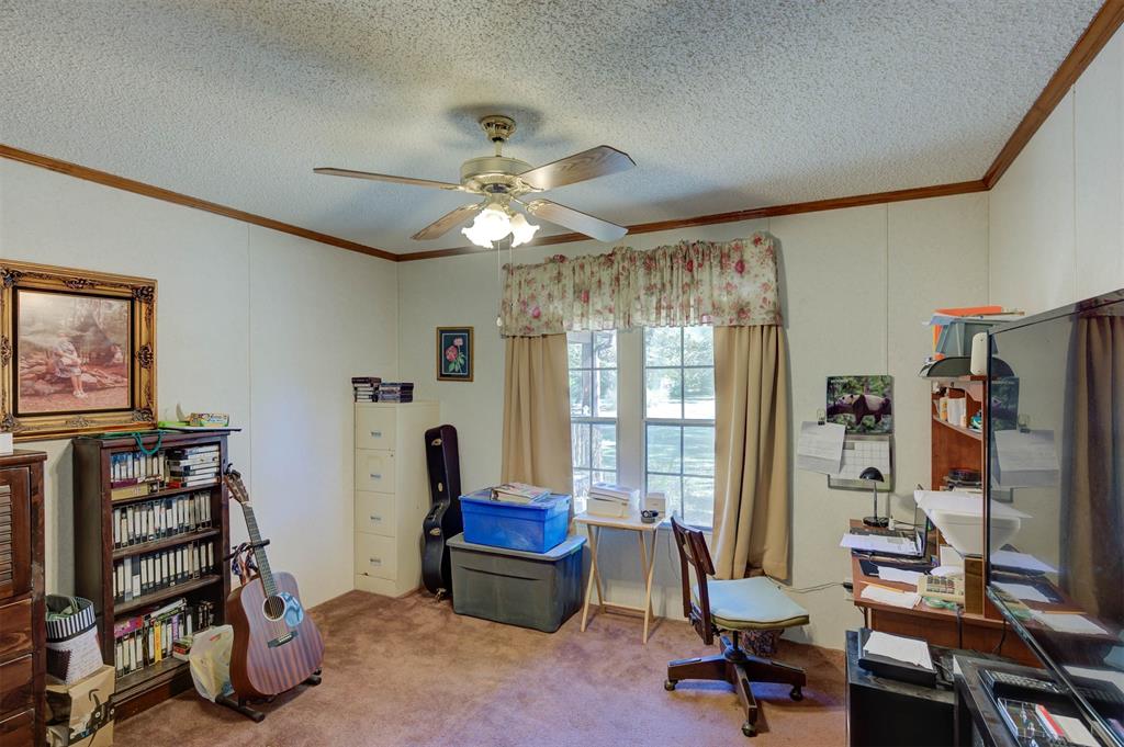 4896 Quiet Acres Road Shreveport, LA 71107 - Photo 19 of 39 a view of a livingroom with workspace and a window