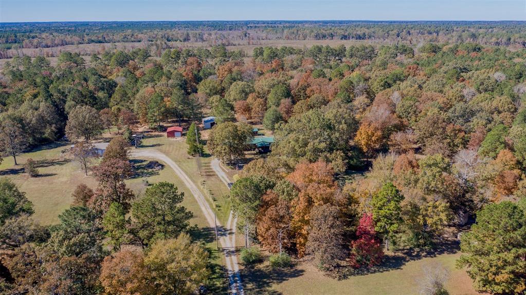 4896 Quiet Acres Road Shreveport, LA 71107 - Photo 2 of 39 a view of a yard with wooden fence