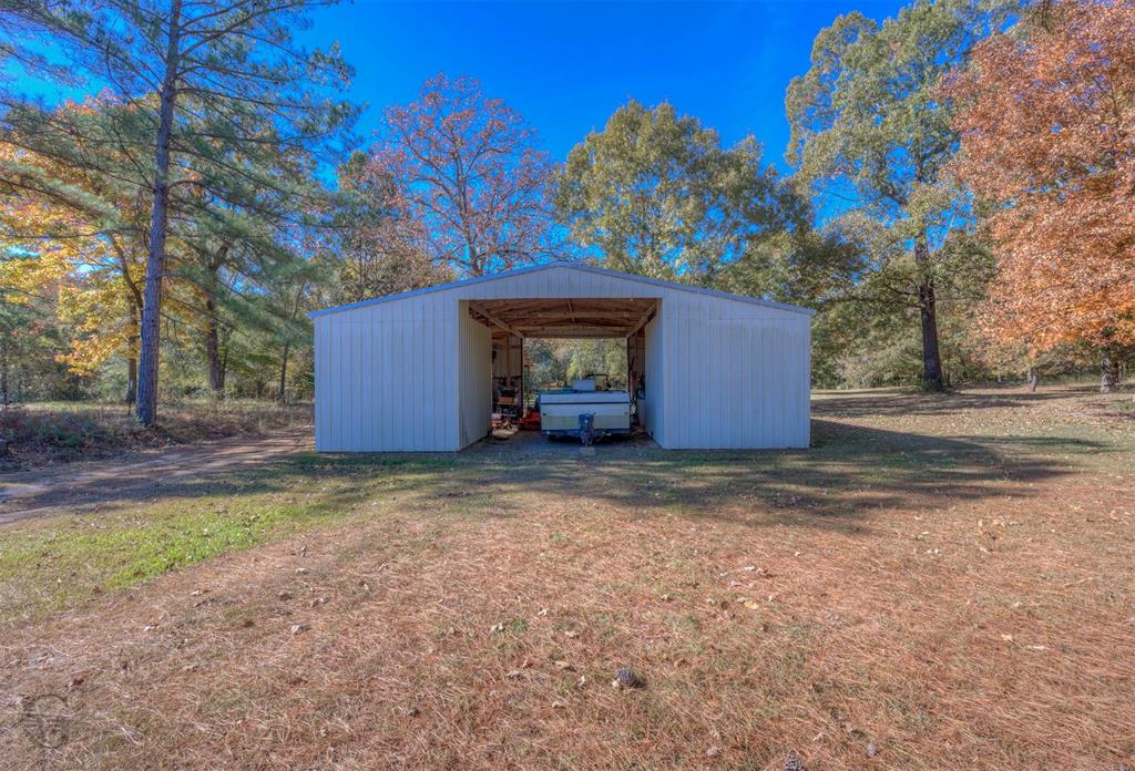 4896 Quiet Acres Road Shreveport, LA 71107 - Photo 28 of 39 a house with a outdoor space