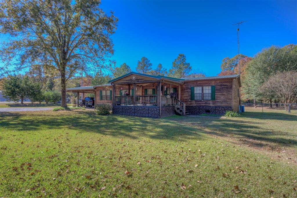 4896 Quiet Acres Road Shreveport, LA 71107 - Photo 3 of 39 a view of a house with a big yard