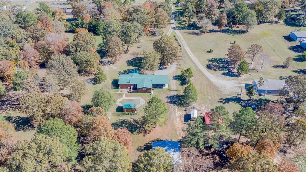 4896 Quiet Acres Road Shreveport, LA 71107 - Photo 36 of 39 an aerial view of house with yard and lake view