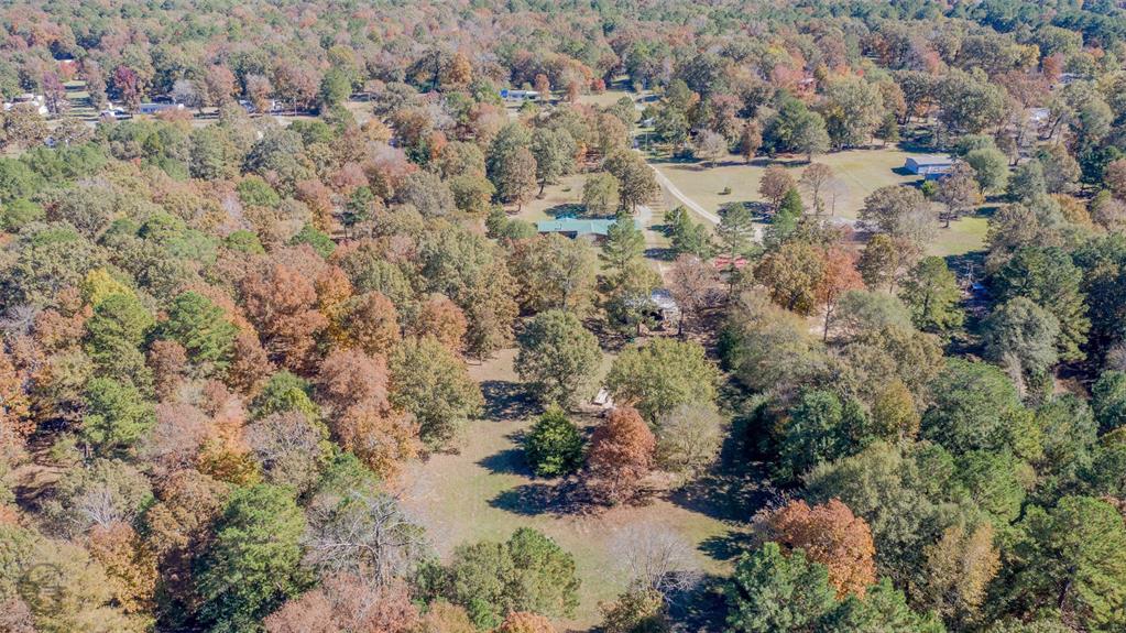 4896 Quiet Acres Road Shreveport, LA 71107 - Photo 39 of 39 a view of outdoor space and covered with trees