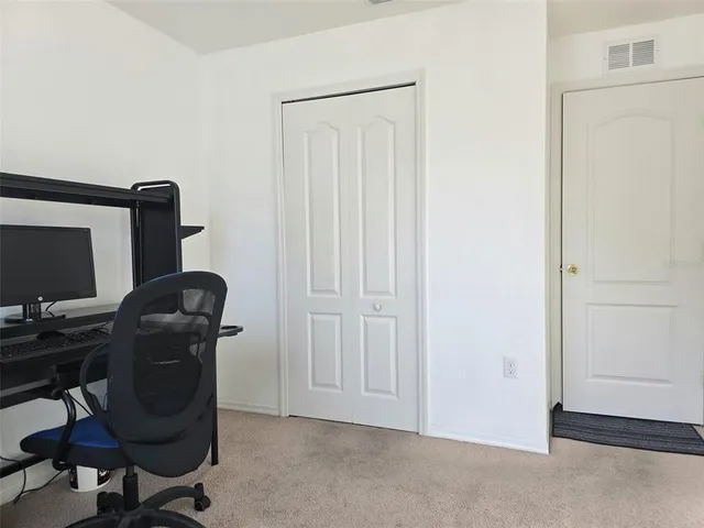 an aerial view of multiple houses with outdoor space