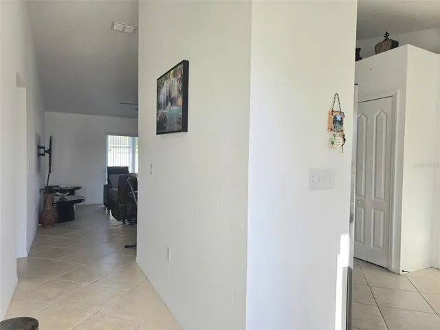 a view of a hallway with entryway