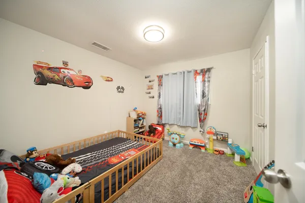 a room with furniture and toys