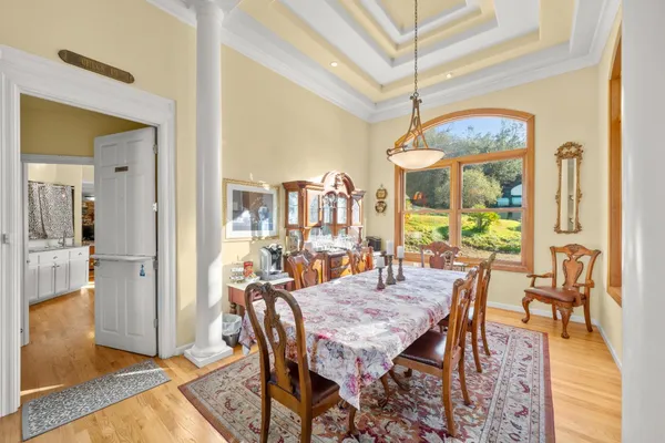 a living room with fireplace furniture and a flat screen tv