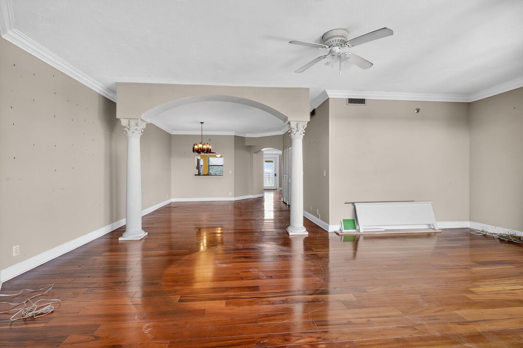 1035 South Federal Highway, Unit PH3 39 Delray Beach, FL 33483 - Photo 15 of 44 a view of an empty room with window and wooden floor