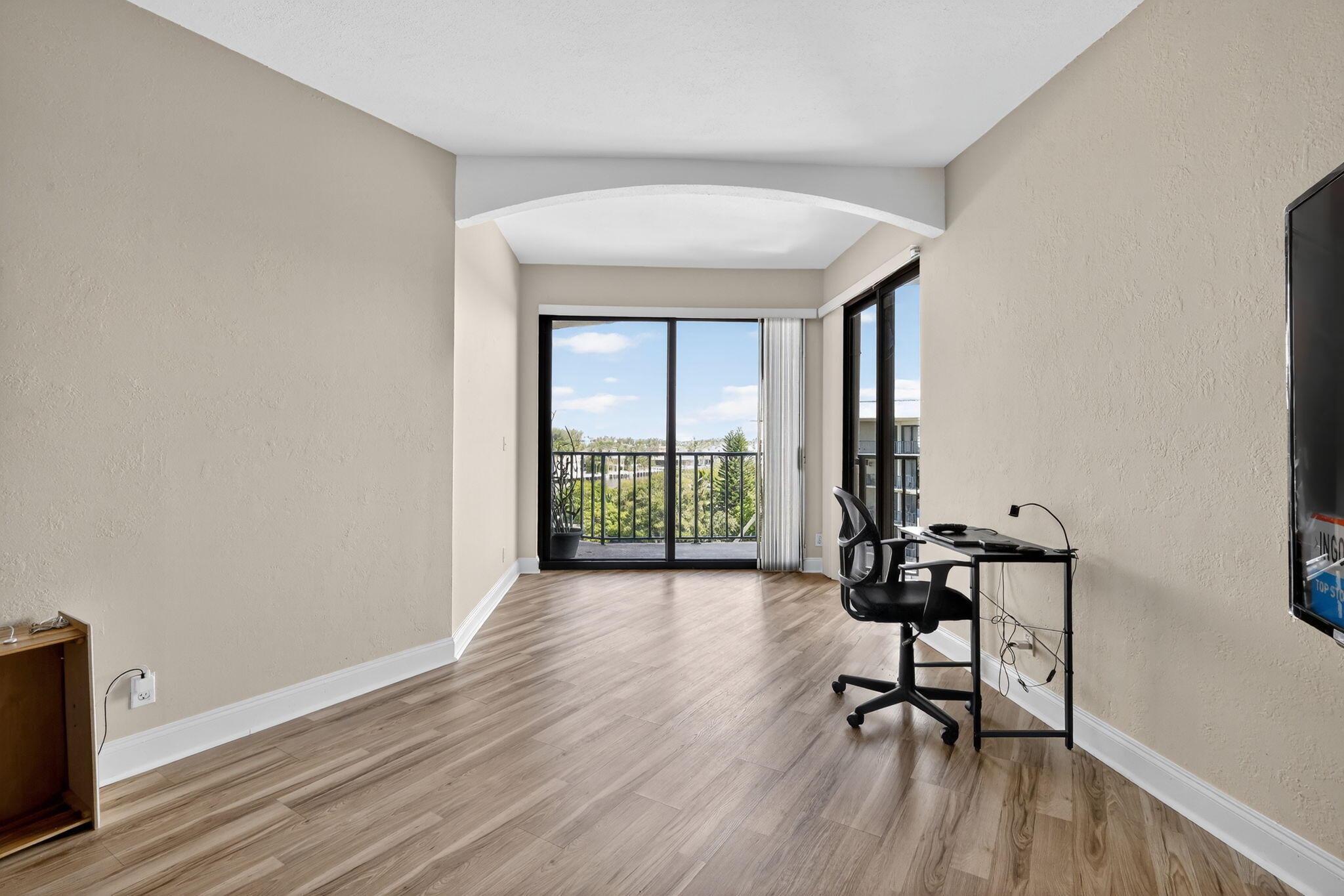1035 South Federal Highway, Unit PH3 39 Delray Beach, FL 33483 - Photo 20 of 44 a view of a room with furniture and wooden floor